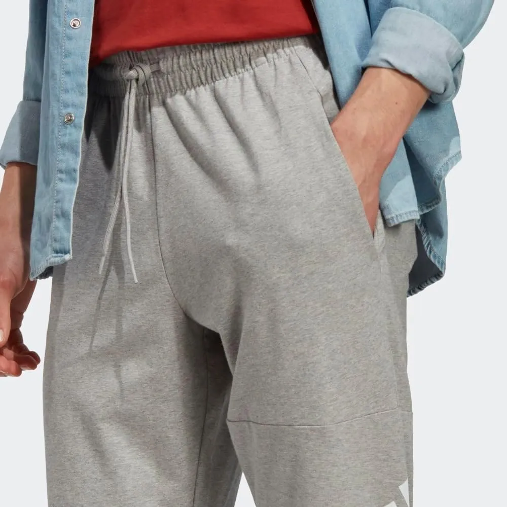 adidas Men's Essentials Single Jersey Tapered Badge of Sport Pants
