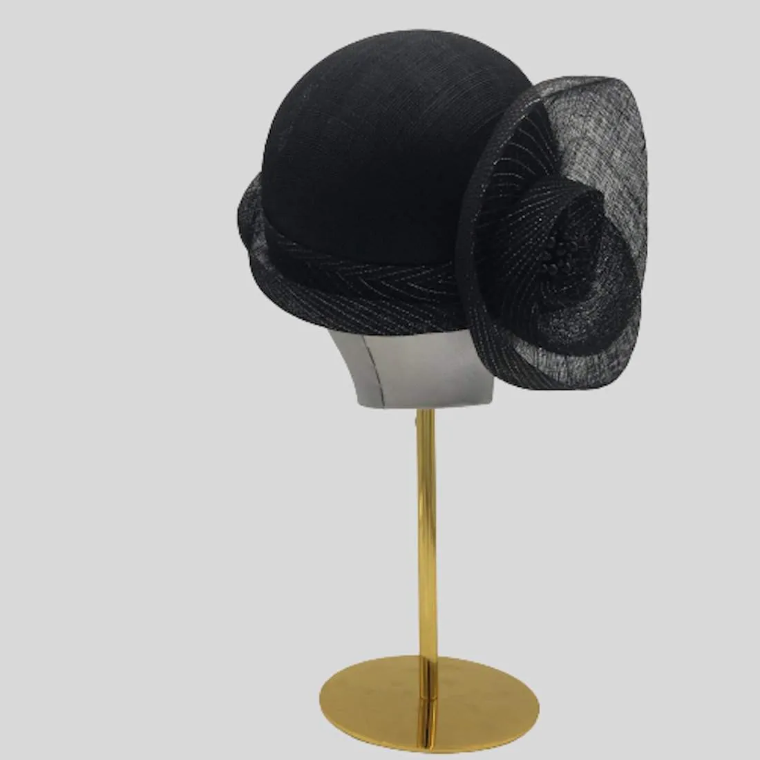 Sinamay cloche with flower trim