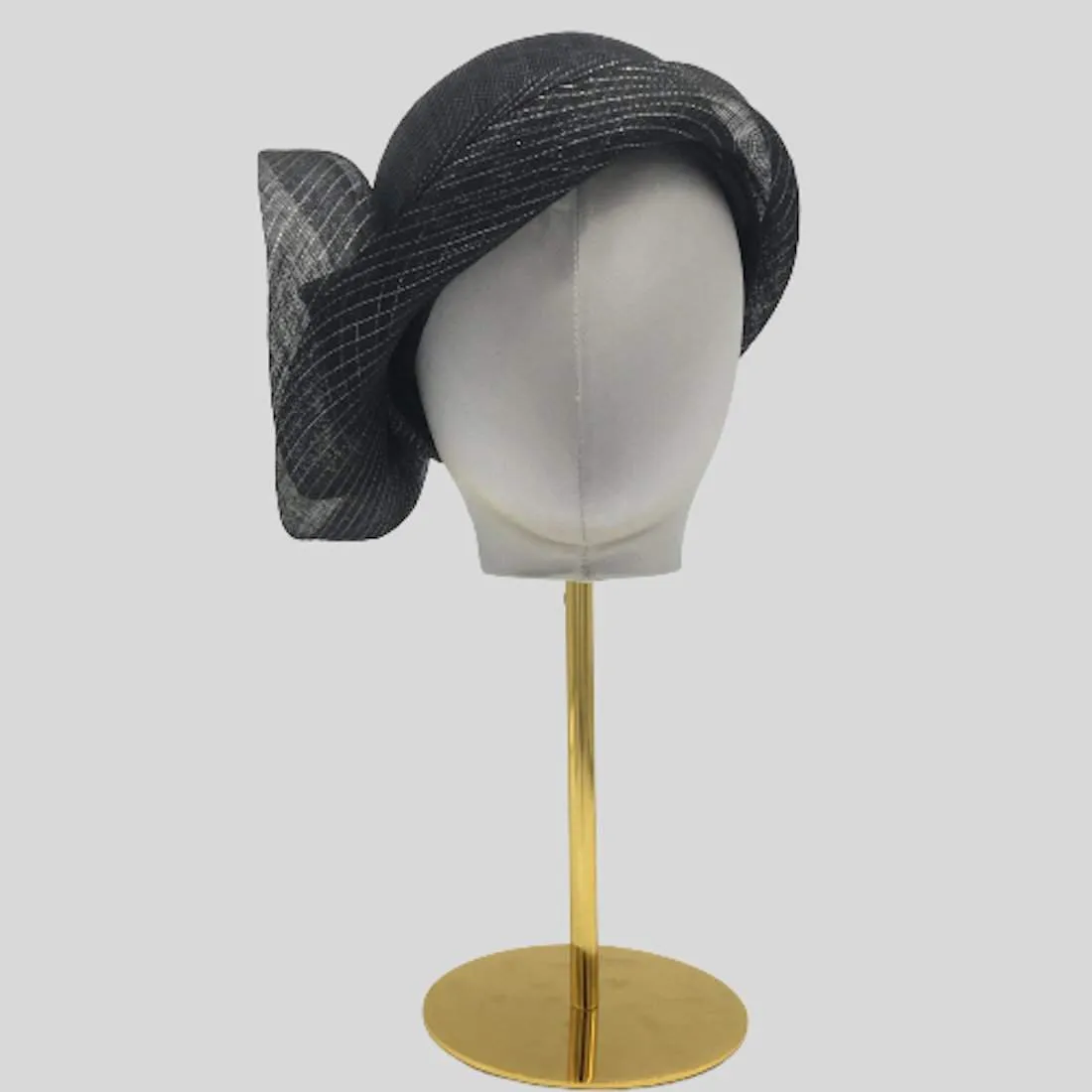 Sinamay cloche with flower trim